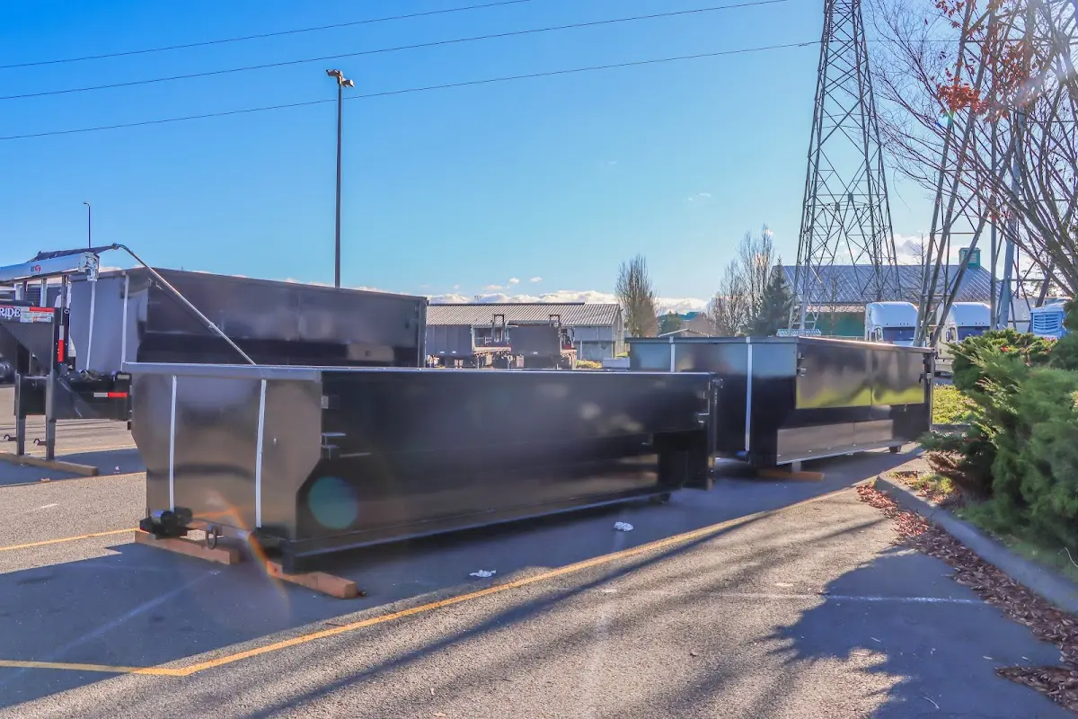 Roll-off dumpster ready for waste disposal at job site for 10 Yard Dumpster Rental in Genoa